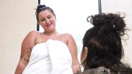 Curvy lesbians with big boobs fuck in the bathroom
