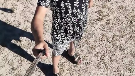 Cute little slut in sandals dressed as a woman in public very hot